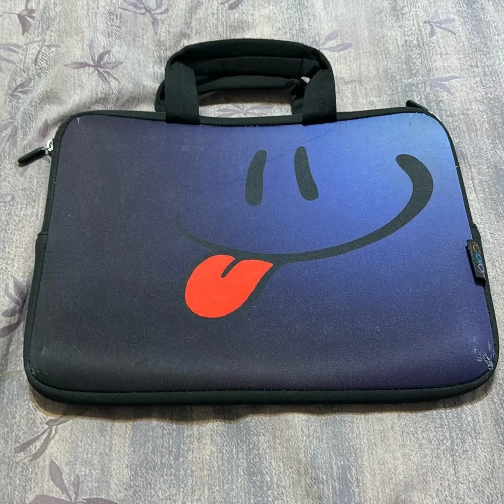 iColor padded Chromebook case. Used. Small rip in lower right hand corner.